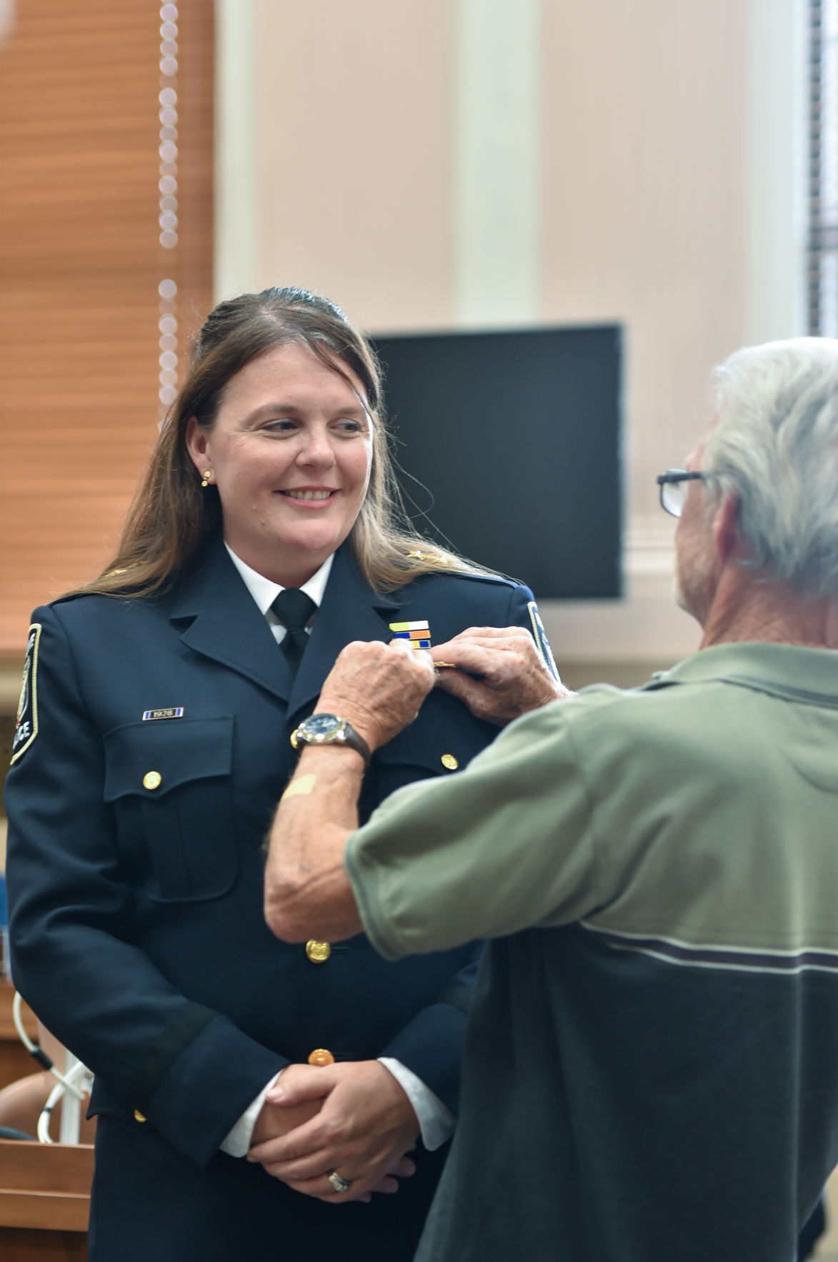 Deputy Chief Jessie Metoyer badge pinning
